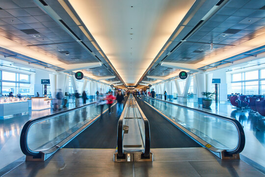 Moving Walkways in Vast and Tight Spaces: Choosing by Distance and Density
